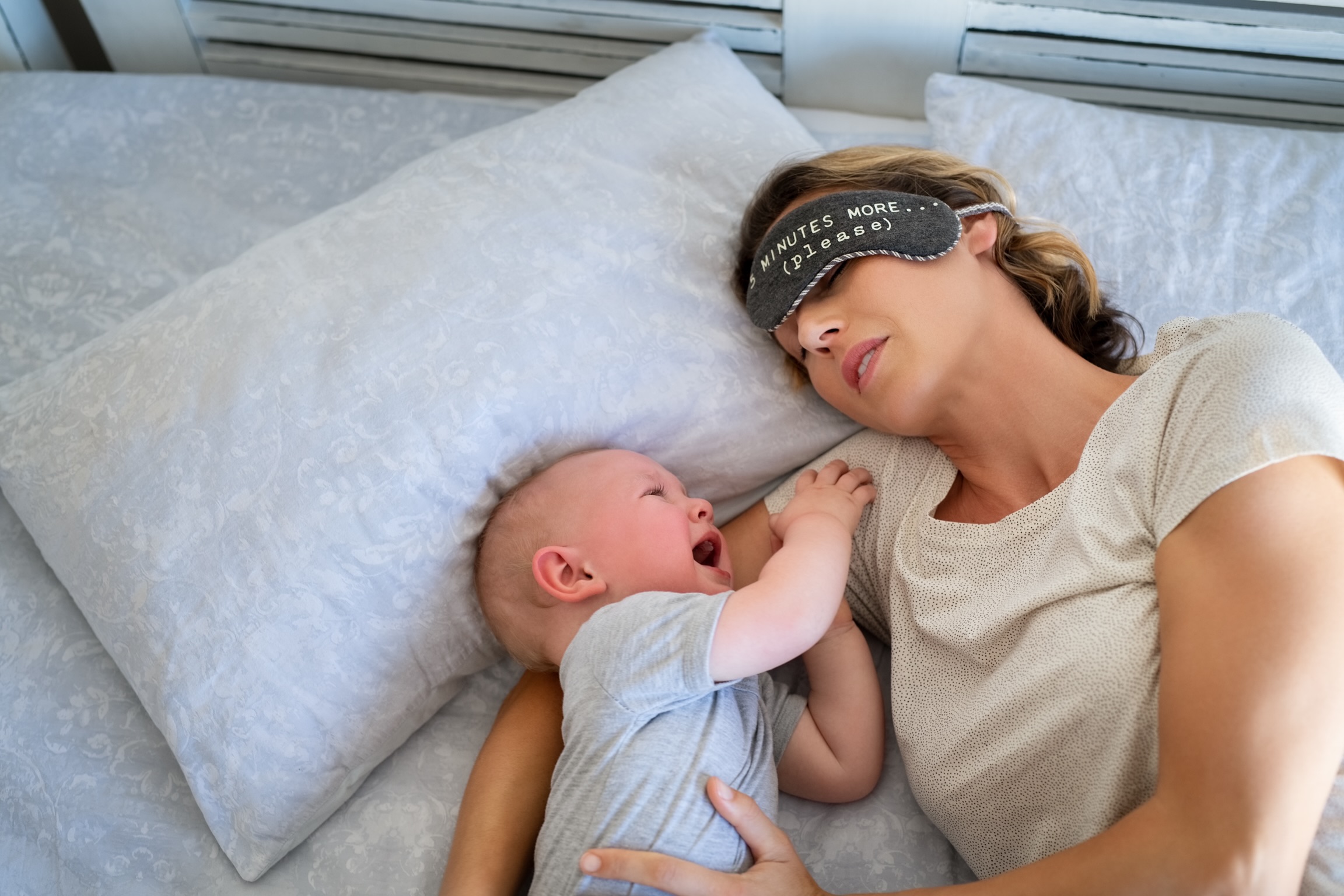 Baby crying while mother sleeping needs help from Baby Sleep Expert